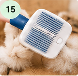 CozyWag self cleaning slicker brush in use